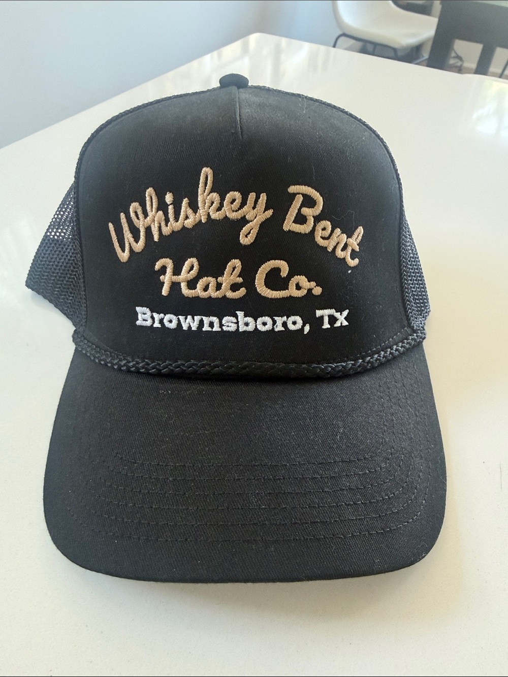 Whiskey Bent Hat Co. Black Trucker Hat with Tan & White Embroidery